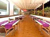 Restauracja w 4R Salou Park Resort II z nakrytymi stołami
