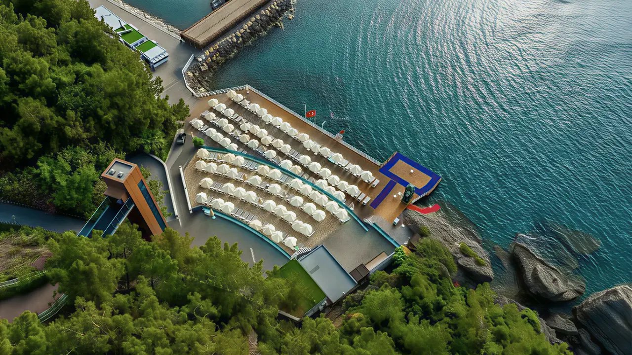 Plaża z leżakami i parasolami w A Good Life Utopia Family Resort