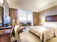 Przytulna sypialnia z widokiem w Acapulco Resort (Kyrenia)