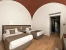 Pokój z łóżkami w Akassia Swiss Resort