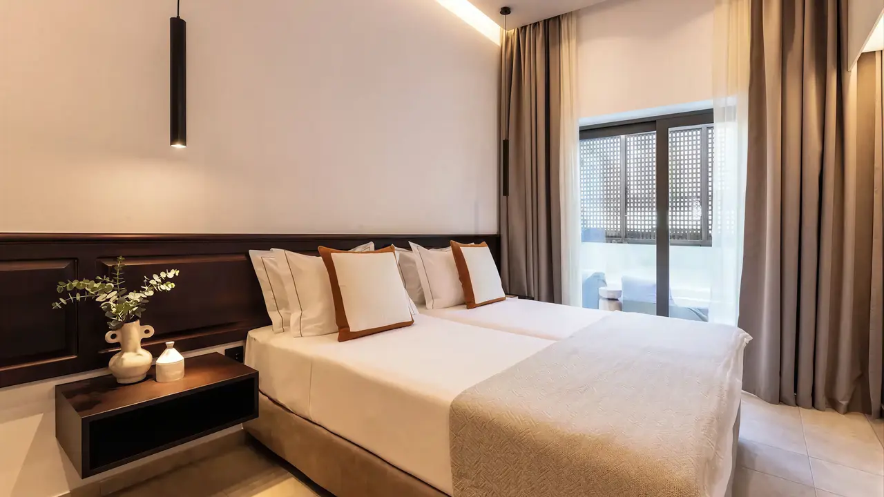 Sypialnia z łóżkiem w Albatros Spa Resort