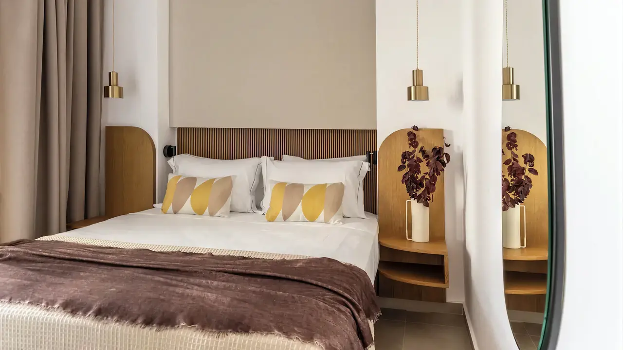 Sypialnia z wygodnym łóżkiem w Albatros Spa Resort