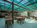 Restauracja na świeżym powietrzu w Alder Resort
