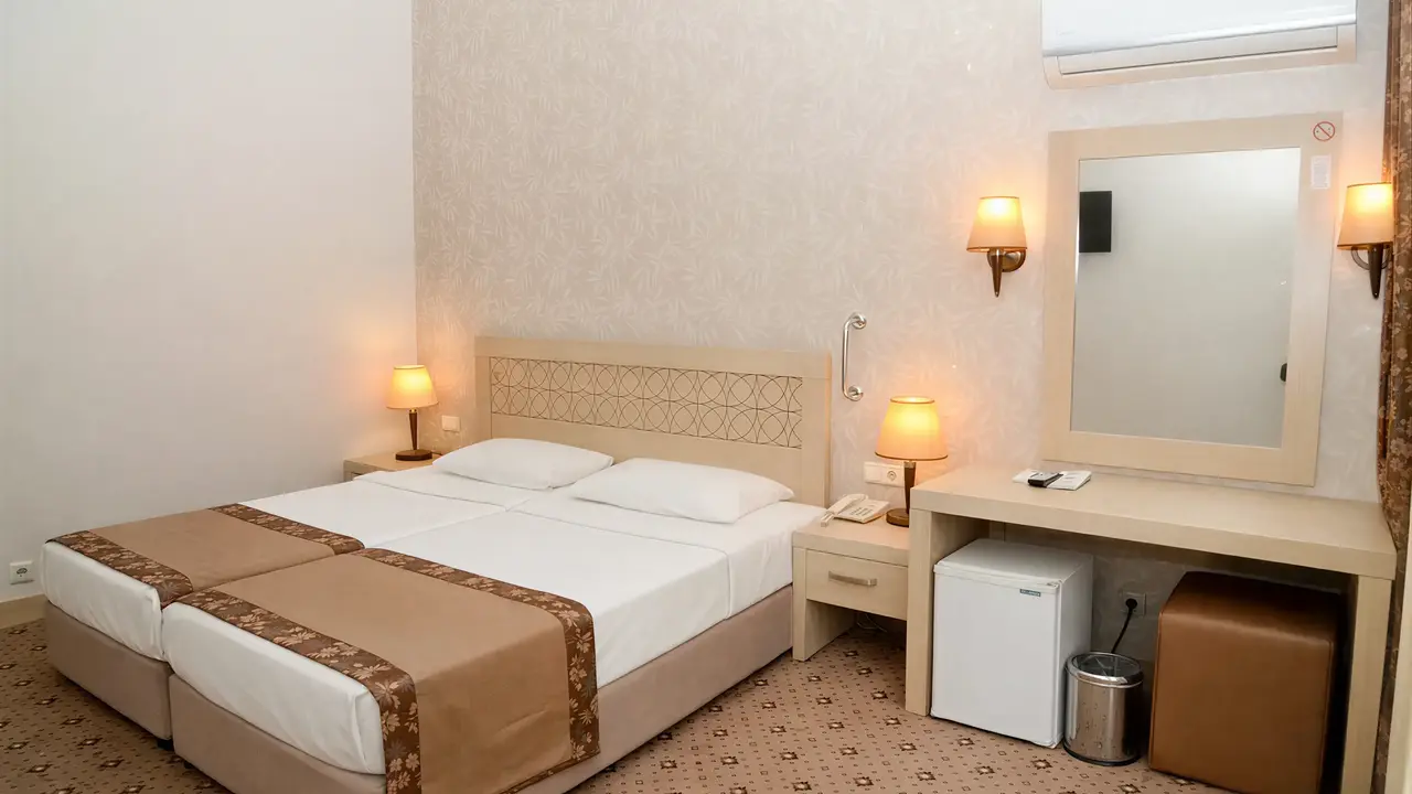 Pokój z łóżkiem w hotelu Alder Resort