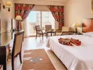 Pokój z łóżkiem w hotelu AMC Royal Hotel & Spa 