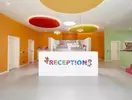 Kolorowa recepcja klubu dla dzieci w Arycanda Kirman Premium