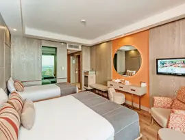 Pokój z łóżkami w hotelu Arycanda Kirman Premium
