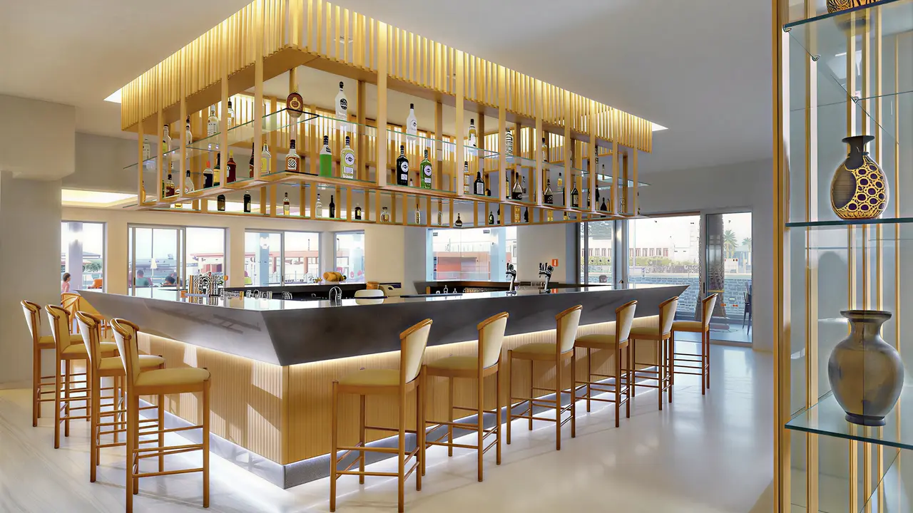 Elegancki bar z wysokimi stołkami w Astir Beach
