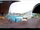 Basen i taras z meblami w Belcekum Beach