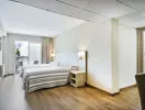 Pokój z łóżkiem w hotelu Best San Diego