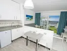 Aneks kuchenny i pokój w Bungalows Vista Oasis
