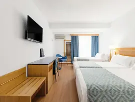 Pokój z łóżkami w hotelu Catalonia Las Vegas