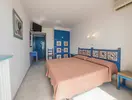 Pokój z łóżkami w Checkin Garbi