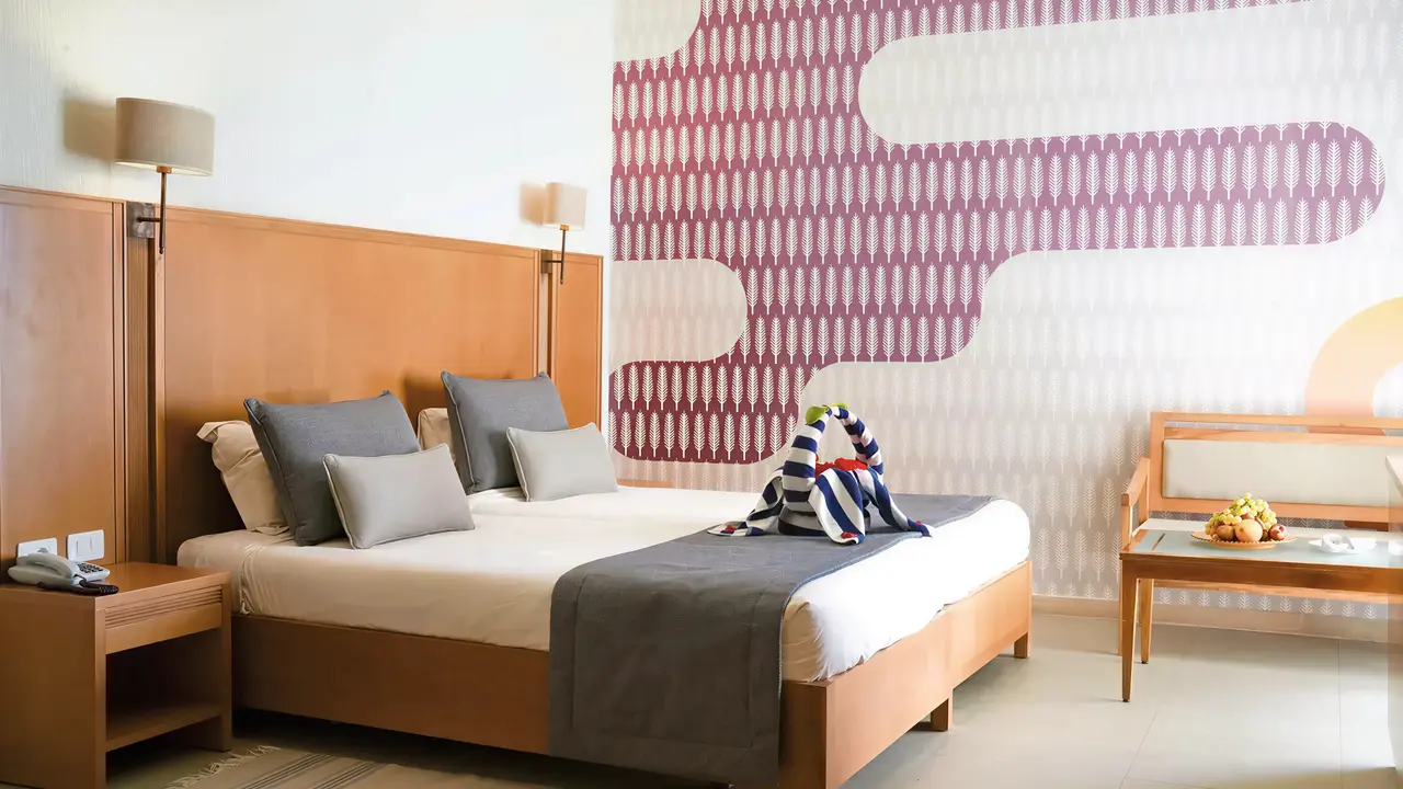 Pokój z łóżkiem w Club Calimera Yati Beach