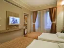Pokój z łóżkami w Club Grand Side