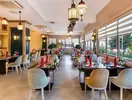 Elegancka restauracja w Club Phaselis Rose z nakrytymi stołami