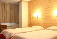 Pokój z łóżkami w Cortina