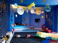Pokój dla dzieci w Daios Cove Luxury Resort & Villas z zabawkami