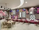 Elegancka restauracja w Delphin Be Grand Resort (ex Botanik Lara) z nakrytymi stołami