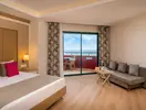 Wnętrze pokoju gościnnego w Delphin Deluxe Resort