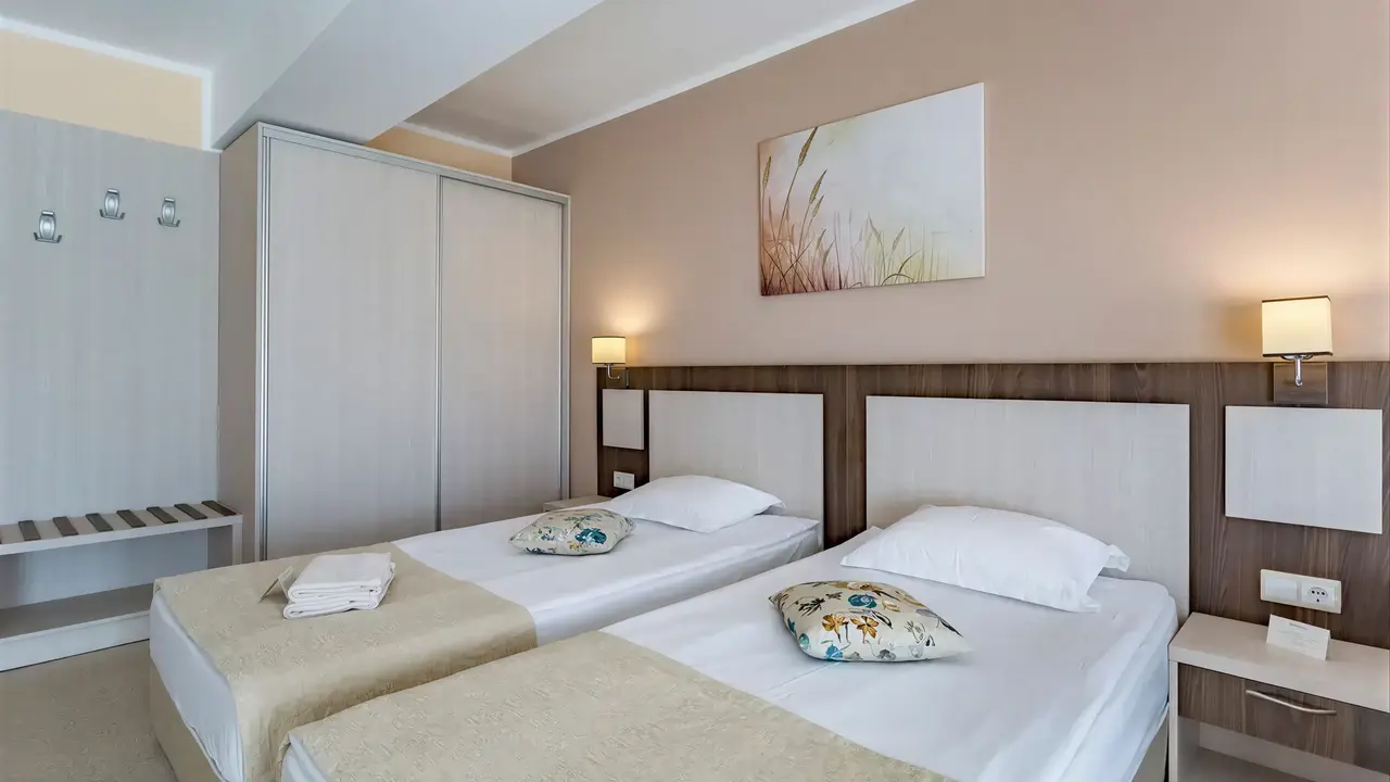 Pokój z dwoma łóżkami w DIT Evrika Beach Club