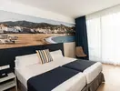 Pokój z łóżkiem w hotelu Don Juan Tossa