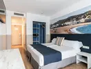 Pokój z łóżkami w hotelu Don Juan Tossa