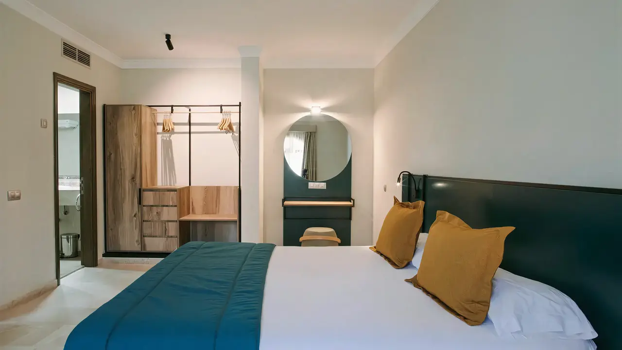 Nowoczesna sypialnia w Dunas Suites & Villas Resort