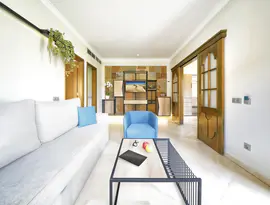 Nowoczesny salon w apartamencie Dunas Suites & Villas Resort