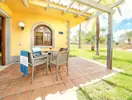 Taras z meblami w Dunas Suites & Villas Resort