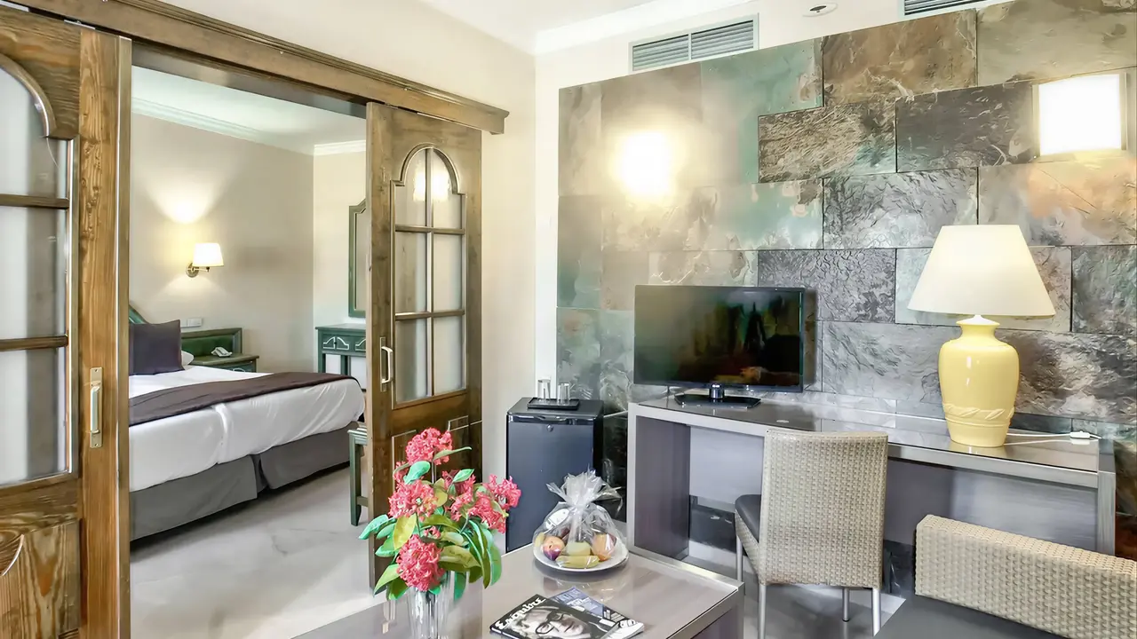 Wnętrze pokoju z salonem w Dunas Suites & Villas Resort