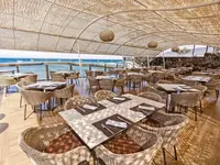 Restauracja w Europe Villa Cortes z widokiem na morze