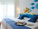 Pokój z łóżkami w hotelu Evenia Olympic Park Resort