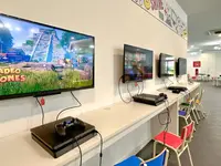 Sala gier z konsolami w Evenia Olympic Park Resort