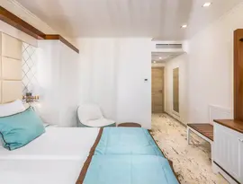 Pokój hotelowy z łóżkiem w Festa Via Pontica