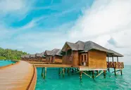 Drewniane domki nad wodą w Fihalhohi Island Resort
