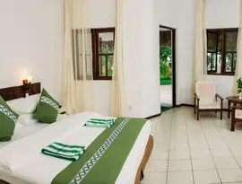 Pokój z łóżkiem w Fihalhohi Island Resort