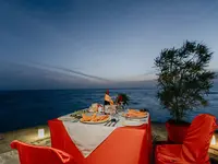 Romantyczna kolacja nad morzem w Fihalhohi Island Resort