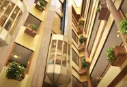 Wnętrze z windą w hotelu GHT Aquarium