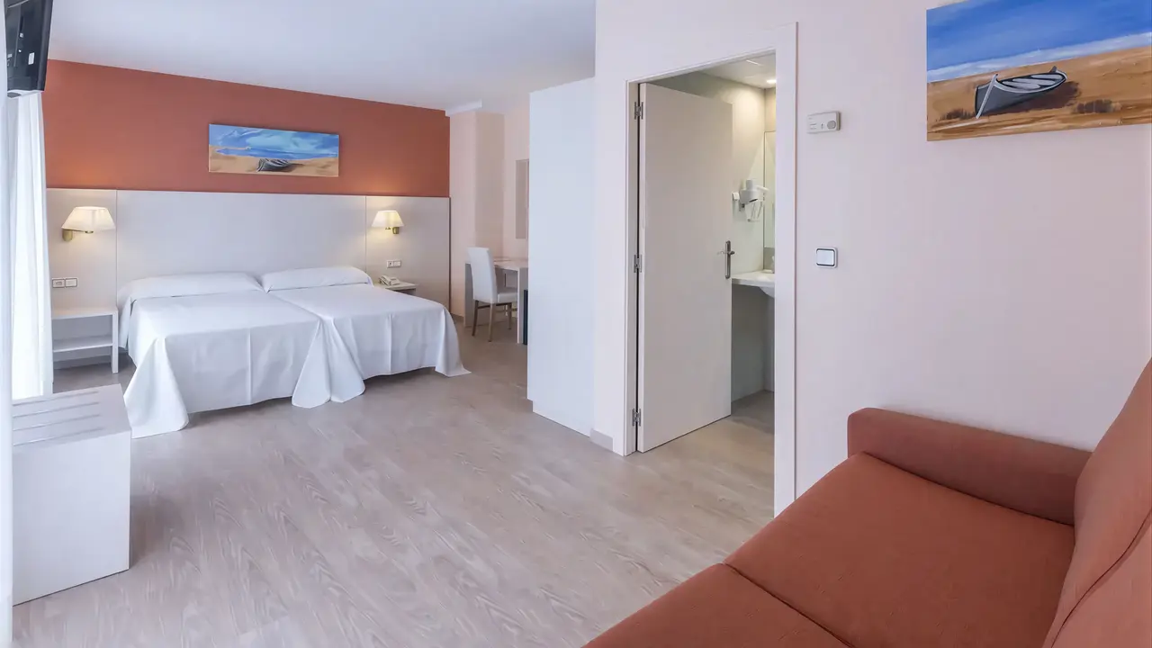 Pokój z łóżkami w GHT Balmes