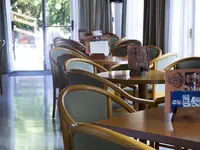 Stolik i krzesła w restauracji GHT Neptuno (Tossa de Mar)