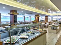 Bufet z jedzeniem w GHT Oasis Tossa