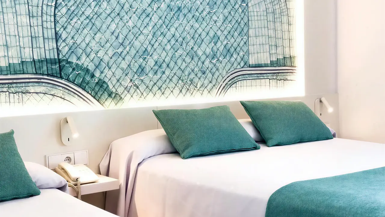 Łóżka w pokoju gościnnym w Golden Taurus Aquapark Resort