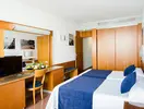 Pokój z łóżkami w hotelu Gran Bali