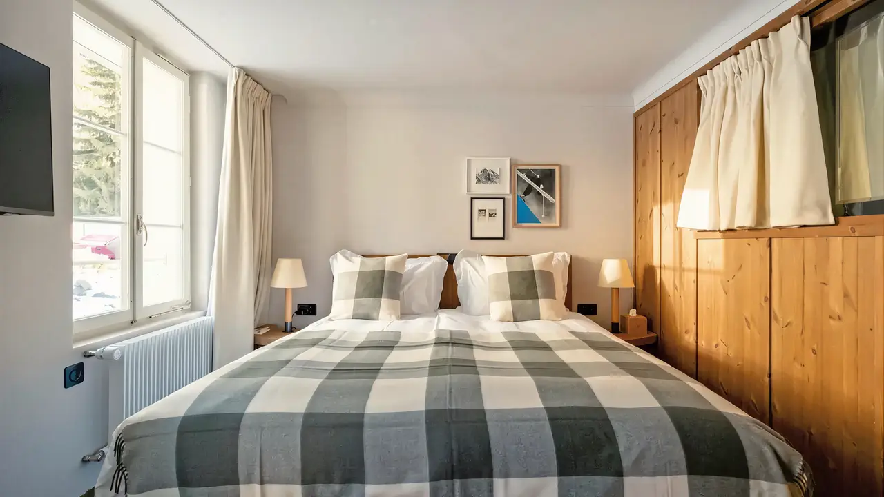Sypialnia z dużym łóżkiem w Grand Hotel Belvedere