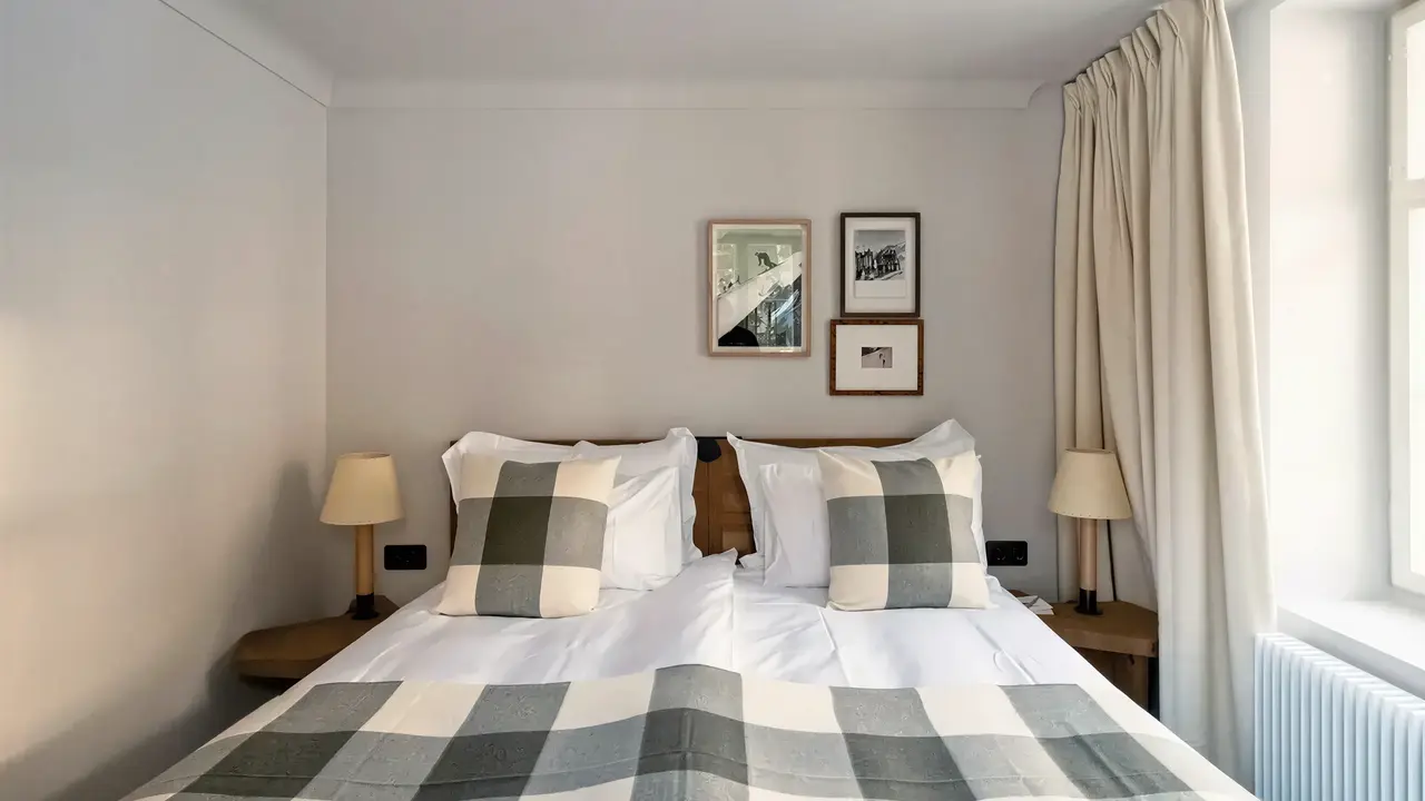 Sypialnia z dużym łóżkiem w Grand Hotel Belvedere