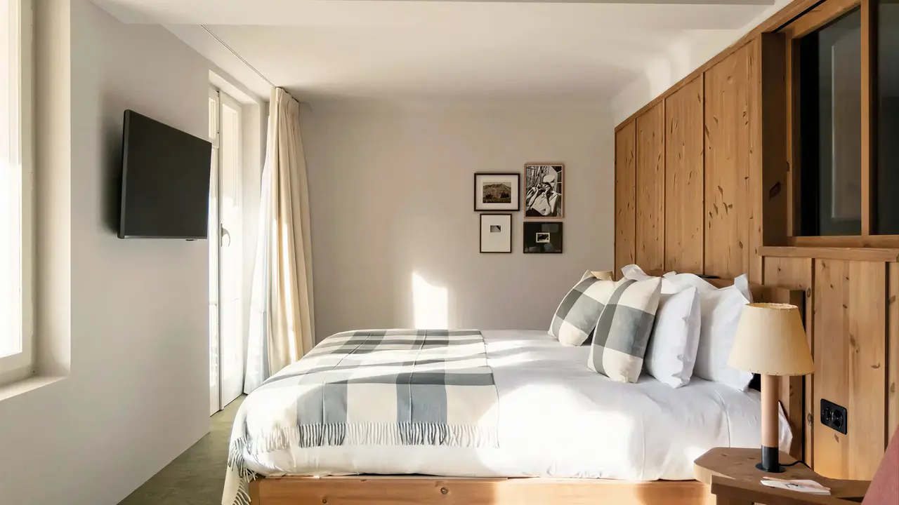 Sypialnia z łóżkiem w Grand Hotel Belvedere