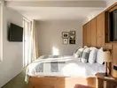 Sypialnia z łóżkiem w Grand Hotel Belvedere