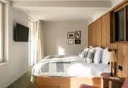 Sypialnia z łóżkiem w Grand Hotel Belvedere