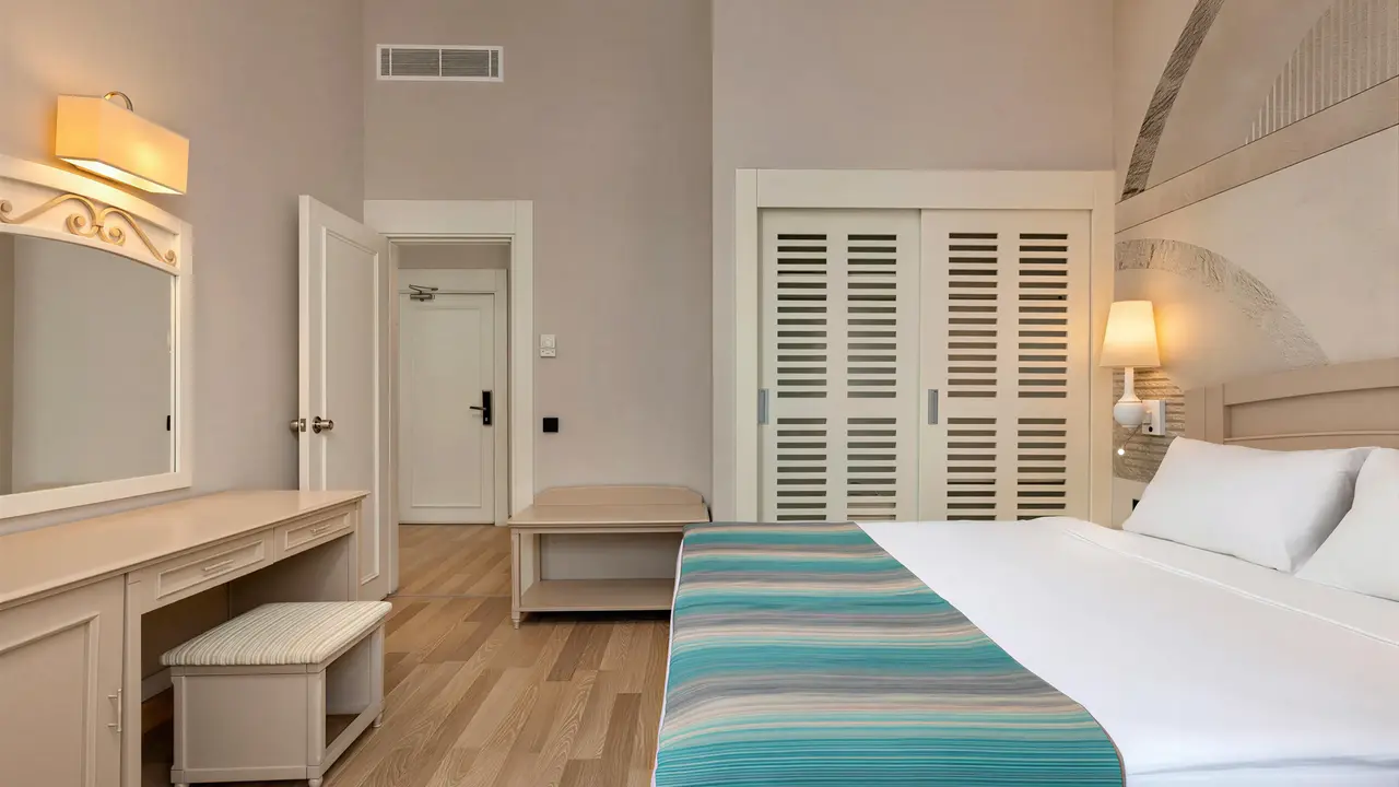 Jasny pokój z łóżkiem w Greenwood Kemer Resort